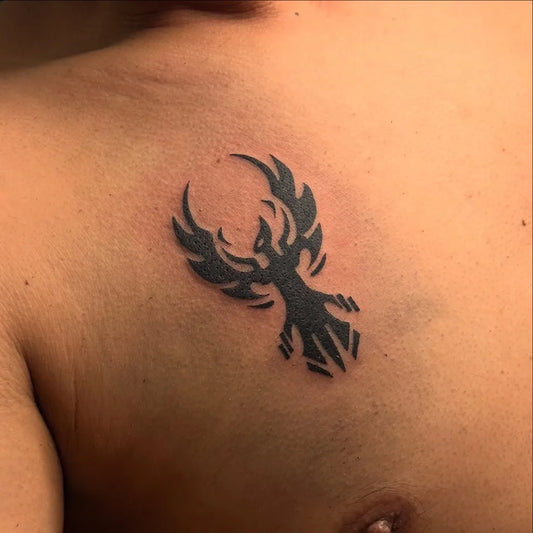 Small Tribal Phoenix on Men Shoulder Tattoo by @369_laplace