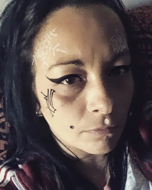 Small Tribal Rune on Women Face Tattoo by @morganauk