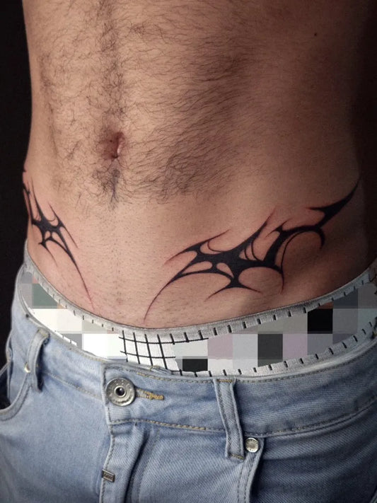 Small Tribal Symmetrical Spikes on Men Abdomen Tattoo by @bl00dy_ink