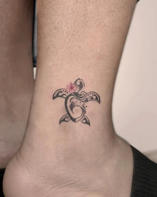 Small Tribal Turtle Tattoo on Women Ankle by @yis.tattoo