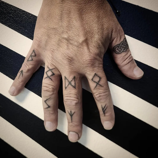 Small Viking Runes on Men Hand Tattoo by @docteurklutz