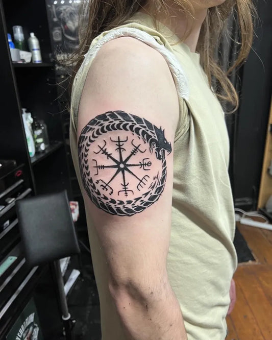 Small Viking Vegvisir encircled by @Ouroboros on Men Arm Tattoo by @psychodelink_tattoo