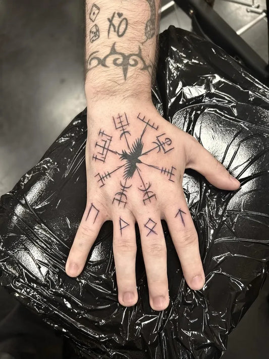 Small Viking Vegvisir on Men Hand Tattoo by @miastattoos