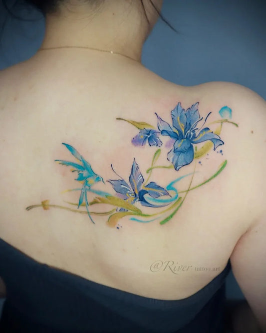 Small Watercolor Blue Iris Flowers on Women Shoulder Tattoo by @rivertattooart