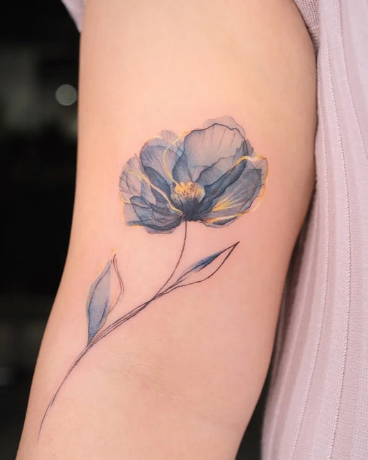 Small Watercolor Blue Poppy on Women Arm Tattoo by @a.ying.tattoo