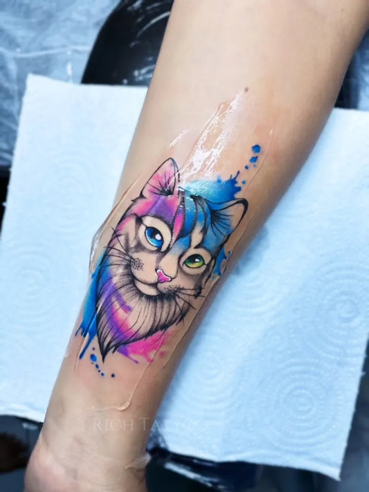 Small Watercolor Cat Portrait on Women Arm Tattoo by @tawaree_sela