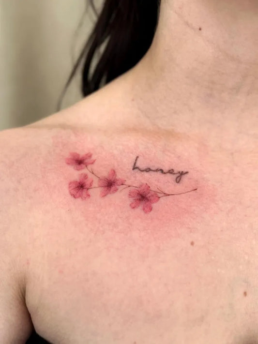 Small Watercolor Cherry Blossom Honey on Women Shoulder Tattoo by @riihitattoo