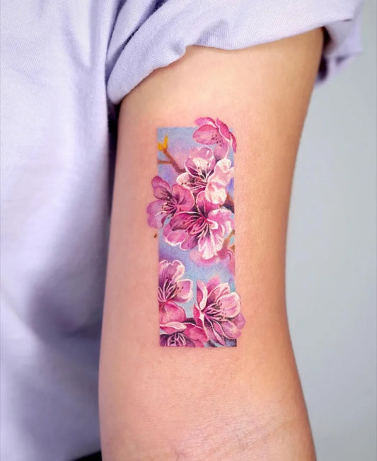 Small Watercolor Cherry Blossom on Women Arm Tattoo by @tattooist_sigak