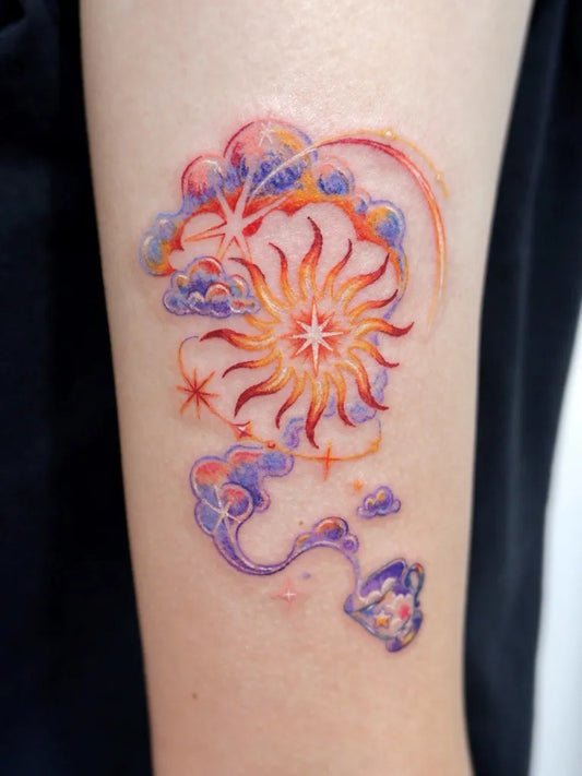 Small Watercolor Cloud and Sun Tattoo on Women Arm by @second.pin