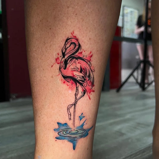 Small Watercolor Flamingo Tattoo on Women Thigh by @inkspirationaruba