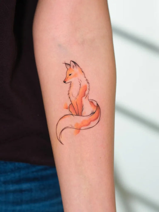 Small Watercolor Fox Tattoo on Women Arm by @tattoo_stop
