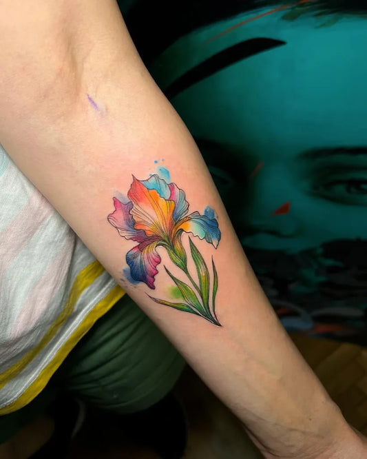 Small Watercolor Iris Flower on Women Arm Tattoo by @inna_nameless