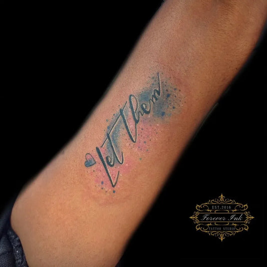 Small Watercolor Let Them Heart on Women Arm Tattoo by @forever_ink_tattoos