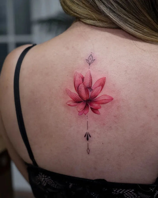 Small Watercolor Lotus Flower and Diamond on Women Back Tattoo by @tattoobyhans