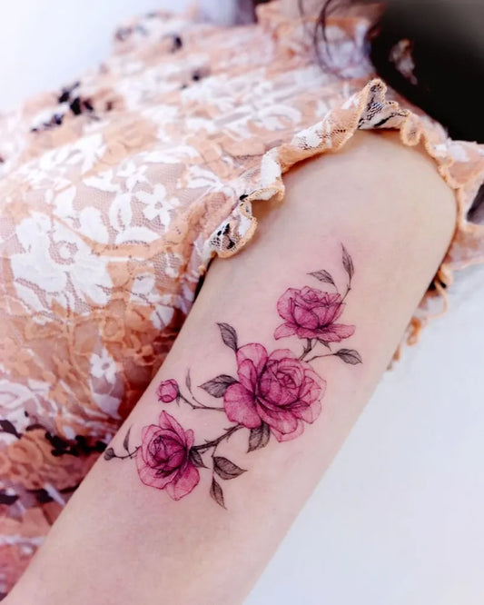 Small Watercolor Pink Rose Branch on Women Arm Tattoo by @cheeu_tattoo