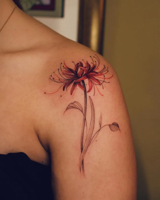 Small Watercolor Red Spider Lily Tattoo on Women Shoulder by @gabriela.staneva