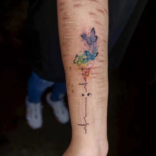 Small Watercolor Semicolon Butterflies on Women Arm Tattoo by @3ravenstattoo