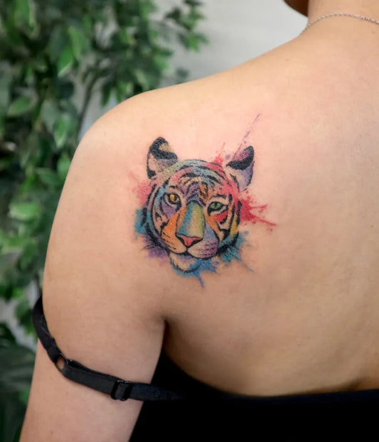 Small Watercolor Tiger on Women Shoulder Tattoo by @rolypolyc