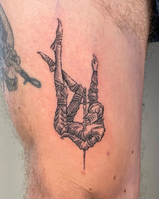 Small Woodcut Bound Figure Tattoo on Men Arm by @5.5volt_tattoo