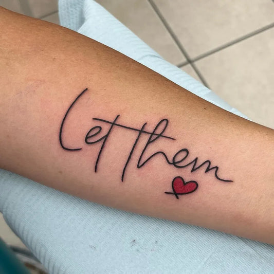 Small Word Script Let Them Heart on Women Arm Tattoo by @gordienumber9