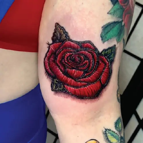 patchwork rose flower tattoo
