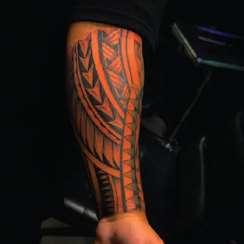 tribal half arm sleeve tattoo