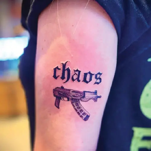 chaos ak-47 machine gun tattoo