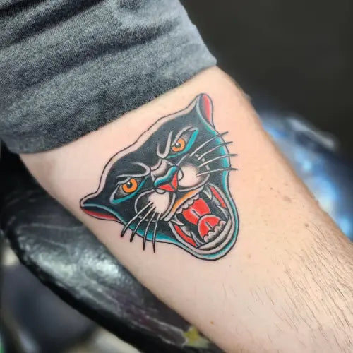 traditional black leopard tattoo