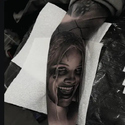 realistic Harley Quinn portrait tattoo