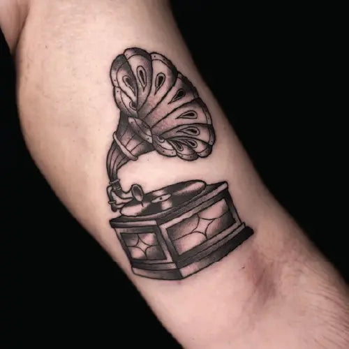 traditional black and grey gramophone tattoo