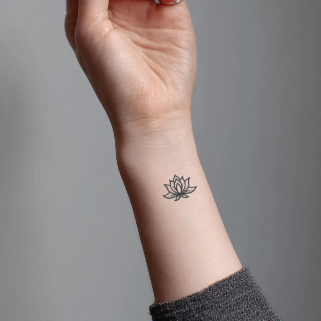 simple small minimal lotus flower wrist temporary tattoo idea design