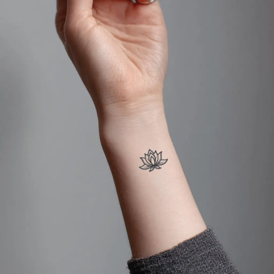 simple small minimal lotus flower wrist temporary tattoo idea design