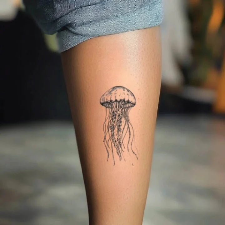 realistic jellyfish leg temporary tattoo idea design