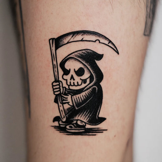 cartoon grim reaper tattoo on forearm