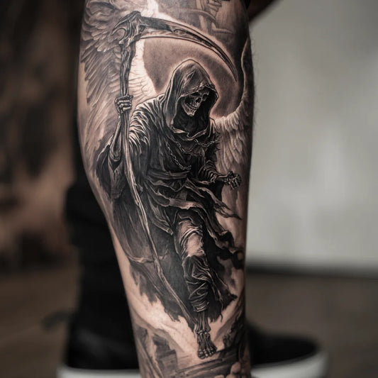 grim reaper and angel tattoo on leg