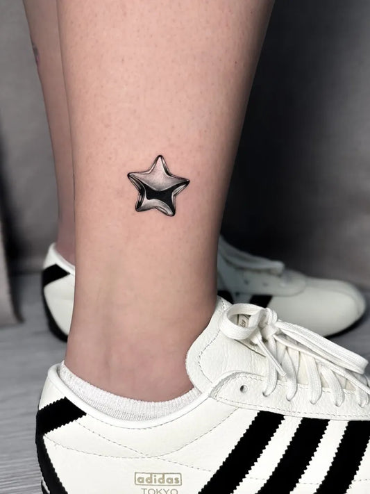 Tiny 3D Star Tattoo on Women Leg by @rose.ttt0