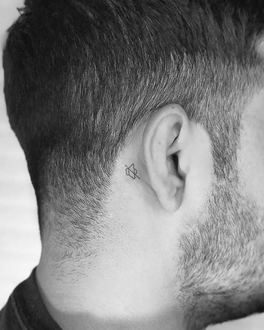 Tiny Blackwork Deaf Mute Tattoo on Men Behind the Ear by @little.tattoos