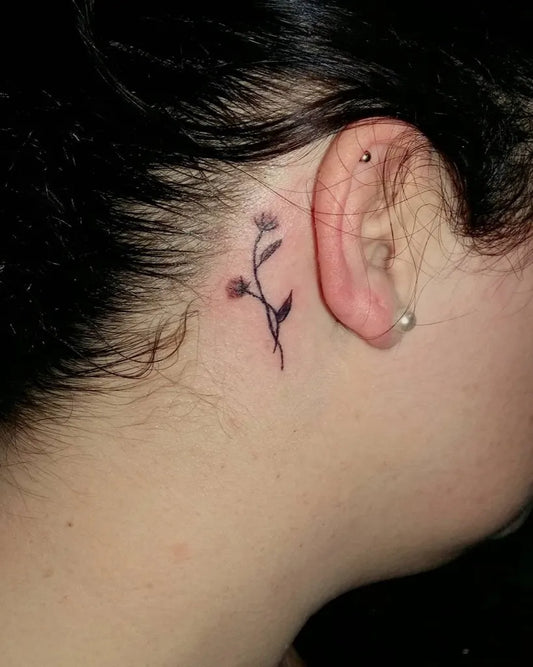 Tiny Blackwork Flower Tattoo on Women Behind the Ear by @forever_ink_tattoos