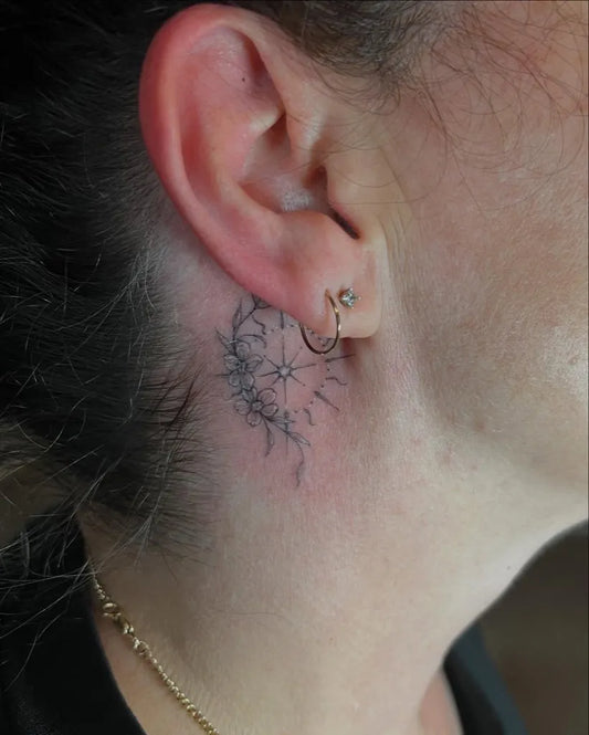 Tiny Blackwork Mandala Tattoo on Women Behind the Ear by @tattoosbyjuliec
