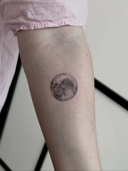 Tiny Blackwork Moon Tattoo on Women Arm by @tweigelt_