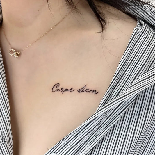 Tiny Blackwork ScriptTattoo on Women Collarbone by @ketch_tatt