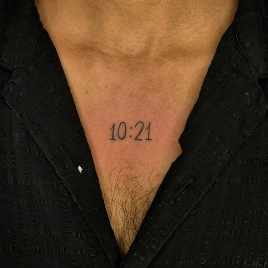 Tiny Blackwork Time Number Tattoo on Men Neck by @d.tattoo_official