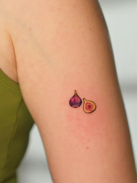 Tiny Colorful Two Figs Tattoo on Women Arm by @tulaayart.stp