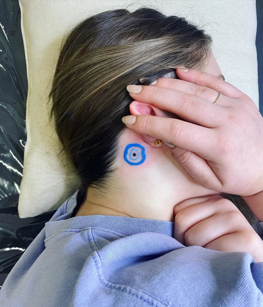Tiny Dotwork Evil Eye on Women Neck Tattoo by @tinytatts_steph