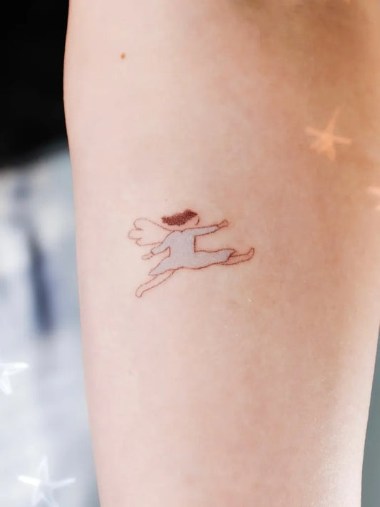 Tiny Fine Line Angel on Women Arm Tattoo by @surfboy_handpoke