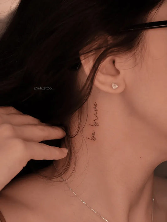 Tiny Fine Line Be Brave Script on Women Neck Tattoo by @adr.tattoo_