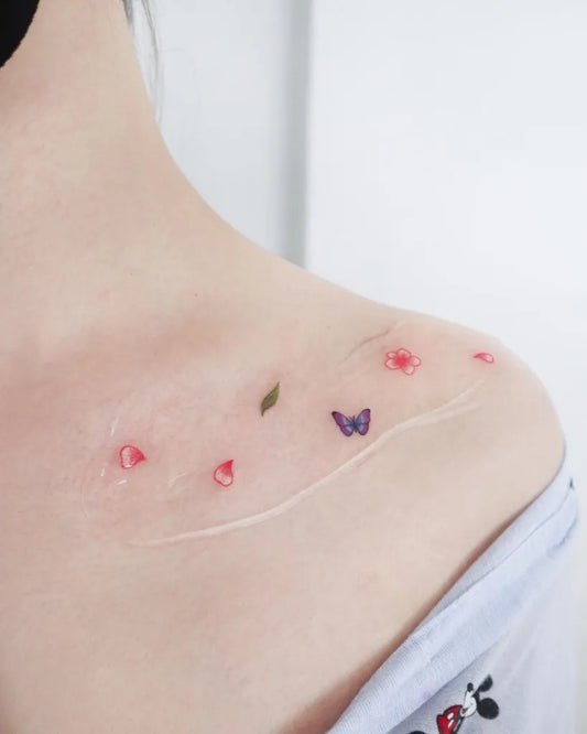 Tiny Fine Line Butterfly and Leaves Tattoo on Women Collarbone by @bay__tattoo