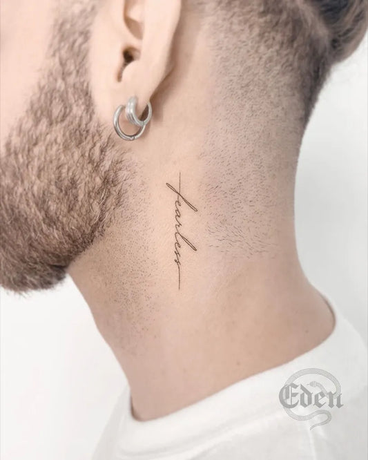 Tiny Fine Line Fearless Quote Tattoo on Men Neck by @eden_tattoos