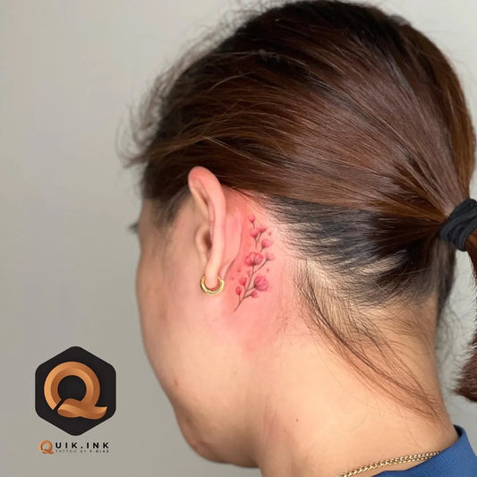 Tiny Fine Line Flower Branch Tattoo on Women Behind the Ear by @quik.ink.tattoo