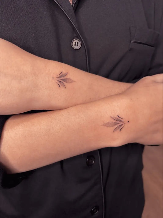 Tiny Fine Line Leaf on Women Wrist Tattoo by @bibi.lea.tattoo